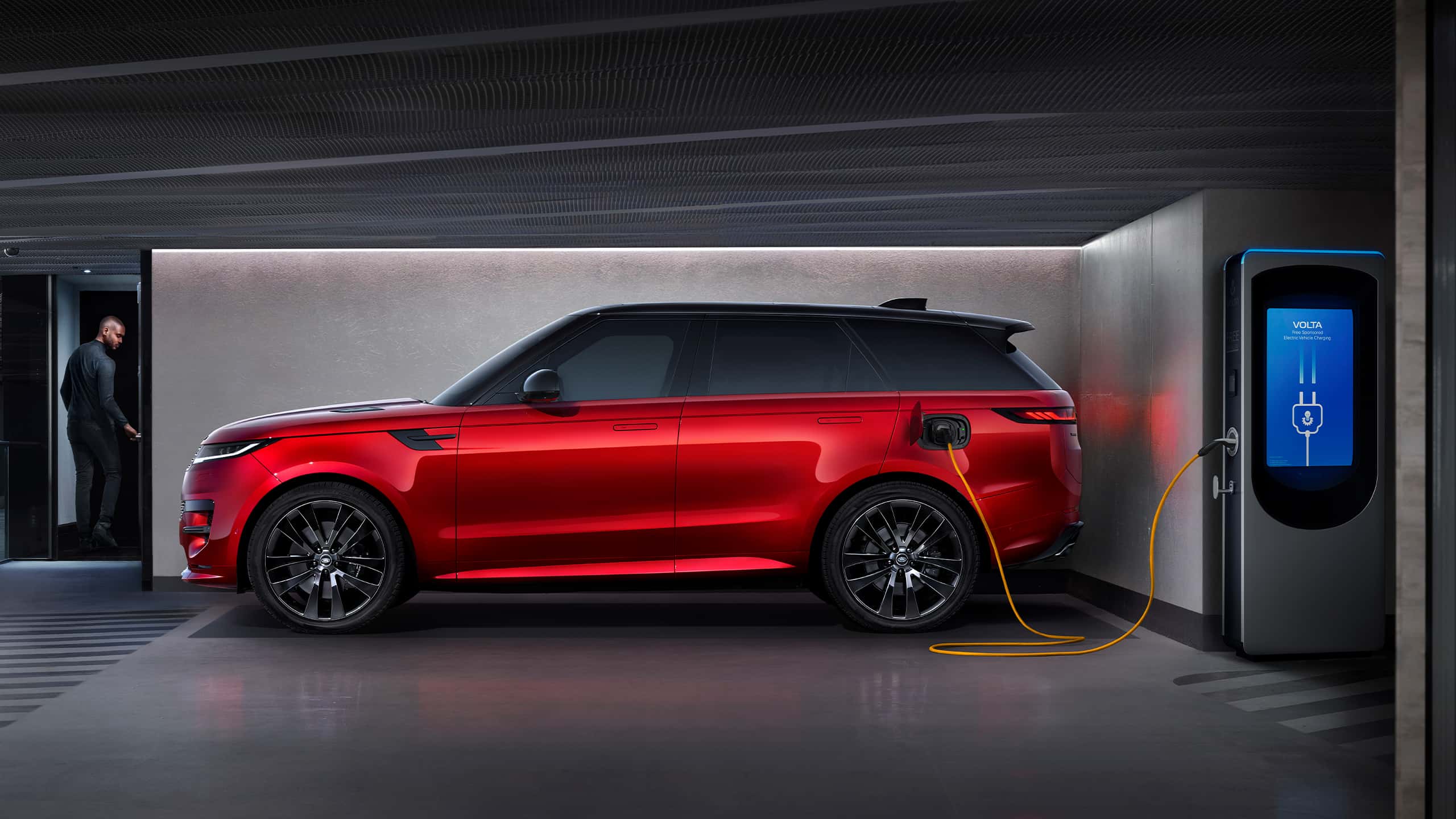 Red Range Rover with charger