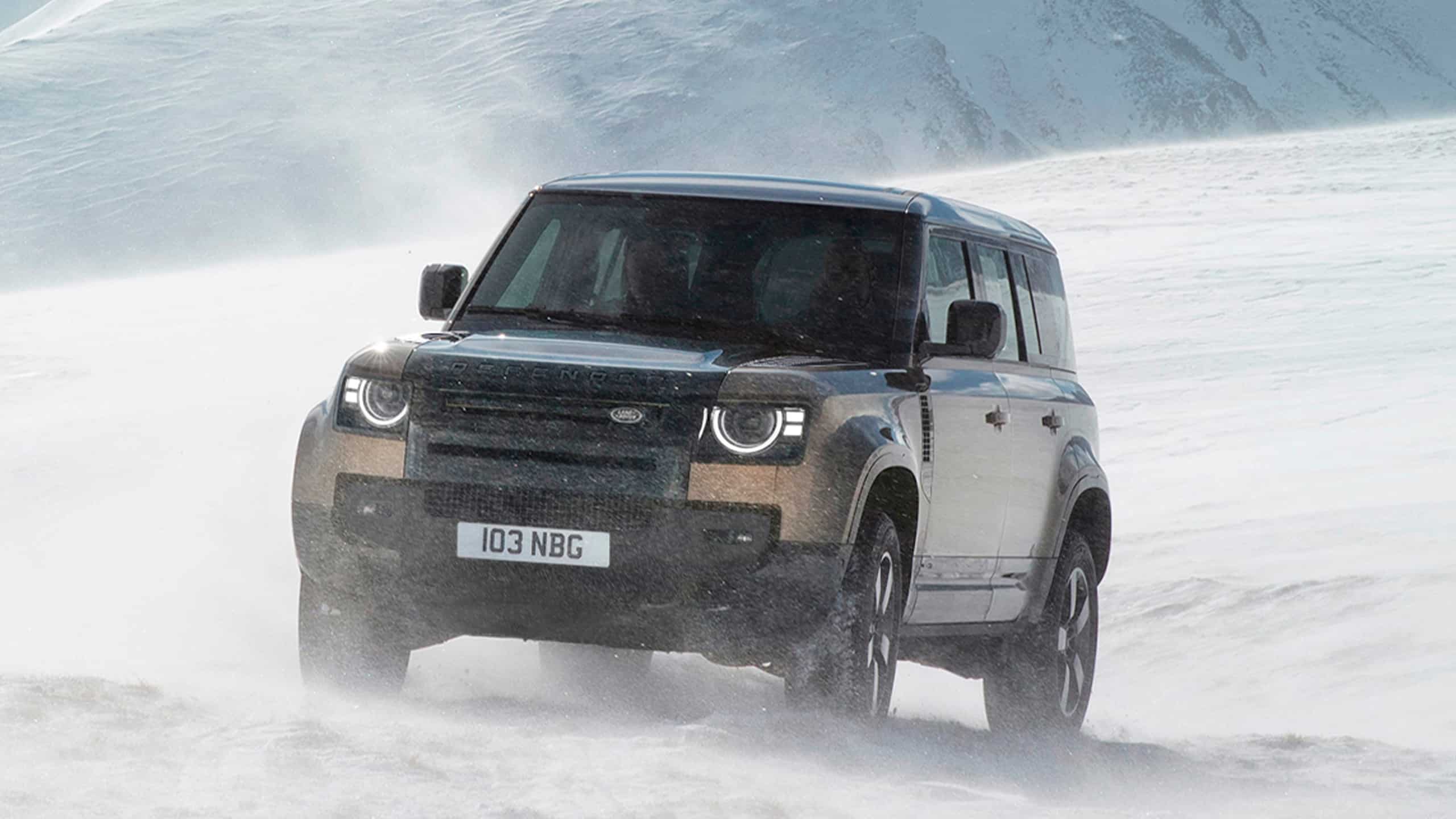 Defender driving on snowy off-road