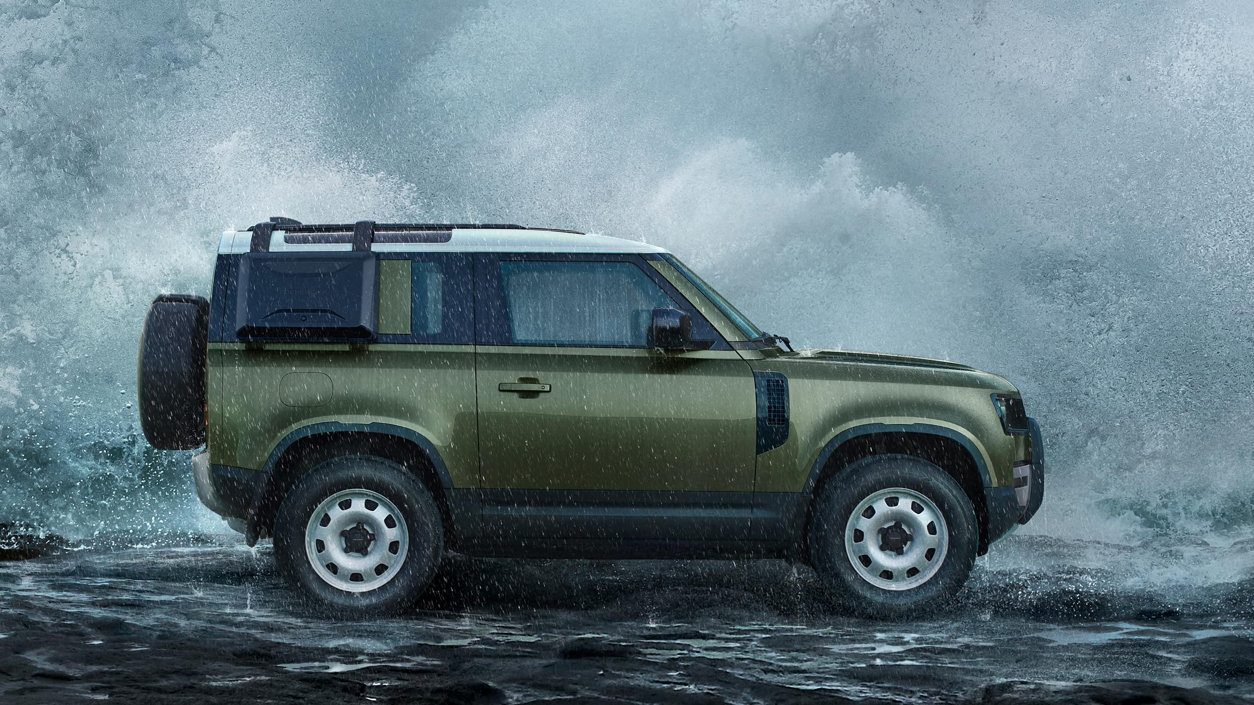 Defender driving in the Rain