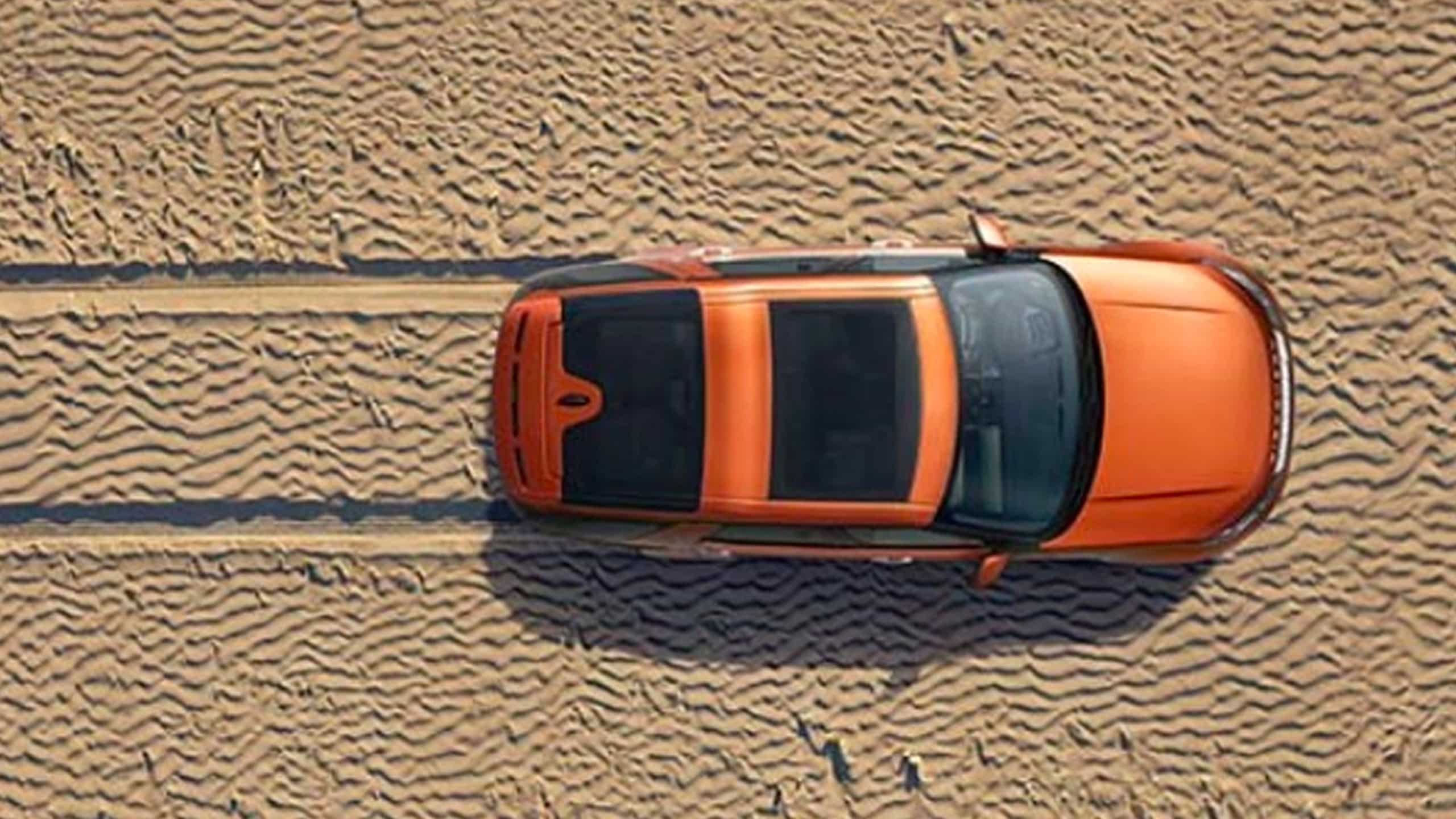 Range Rover moving on Off-road desert safari 