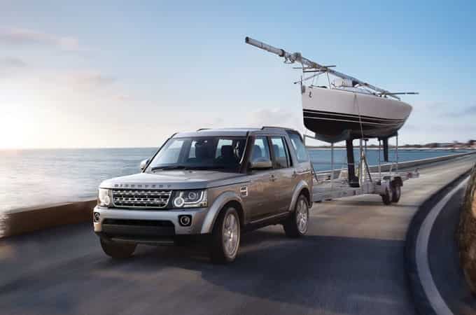 Range Rover driving by the ocean